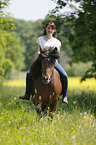 woman rides Icelandic horse