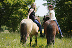 women rides Icelandic horses