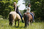 women rides Icelandic horses