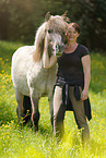 woman and Icelandic horse