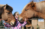 girl and Icelandic horses