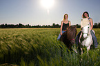 women and Icelandic horses