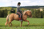 woman rides Icelandic horse