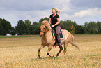 woman rides Icelandic horse