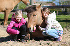 girls and Icelandic Horse