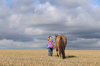 girl and Icelandic Horse