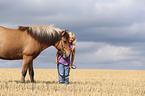 girl and Icelandic Horse