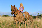 girl and Icelandic Horse