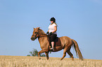 woman rides Icelandic Horse