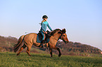 woman rides Icelandic horse