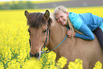 girl rides Icelandic horse