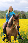 girl rides Icelandic horse