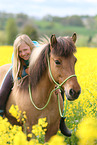 girl rides Icelandic horse