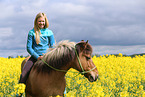 girl rides Icelandic horse