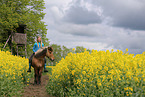 girl rides Icelandic horse