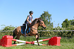 woman rides Icelandic horse