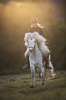 woman rides Icelandic horse