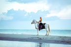 woman rides Irish Tinker