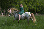 woman rides Knabstrupper