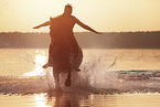 woman rides knabstrup horse