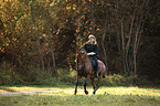 woman rides Lusitano