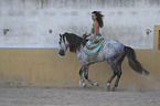 woman rides Lusitano