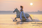 woman and Lusitano