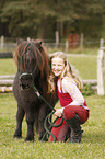 girl and Miniature Shetland Pony