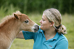 woman and Miniature Shetland Pony foal