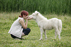 woman and Miniature Shetland Pony foal