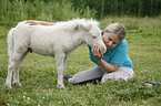 woman and Miniature Shetland Pony foal