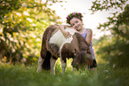 girl and Mini Shetland Pony