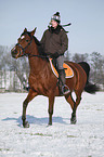 woman rides horse