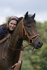 woman rides New Forest Pony