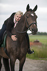 woman and Oldenburg Horse