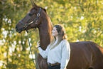 woman and  Oldenburg Horse