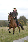 woman rides Paso Iberoamericano