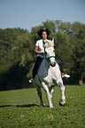 woman rides Percheron