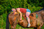 woman and Polish Warmblood