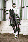 woman rides Polish Warmblood