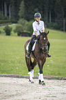 woman rides Polish Warmblood