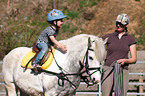 girl learns riding