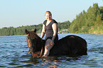 woman rides pony