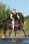 woman rides pony