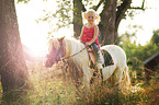 girl rides pony