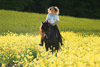 woman rides Pura Raza Espanola