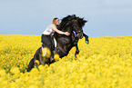 woman rides Pura Raza Espanola