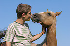 boy and Quarter Horse Foal
