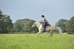 woman rides Quarter Horse