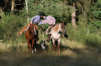 riders with Quarter Horses